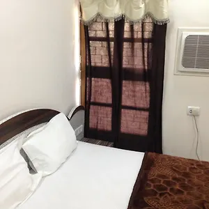 H M International Hotel